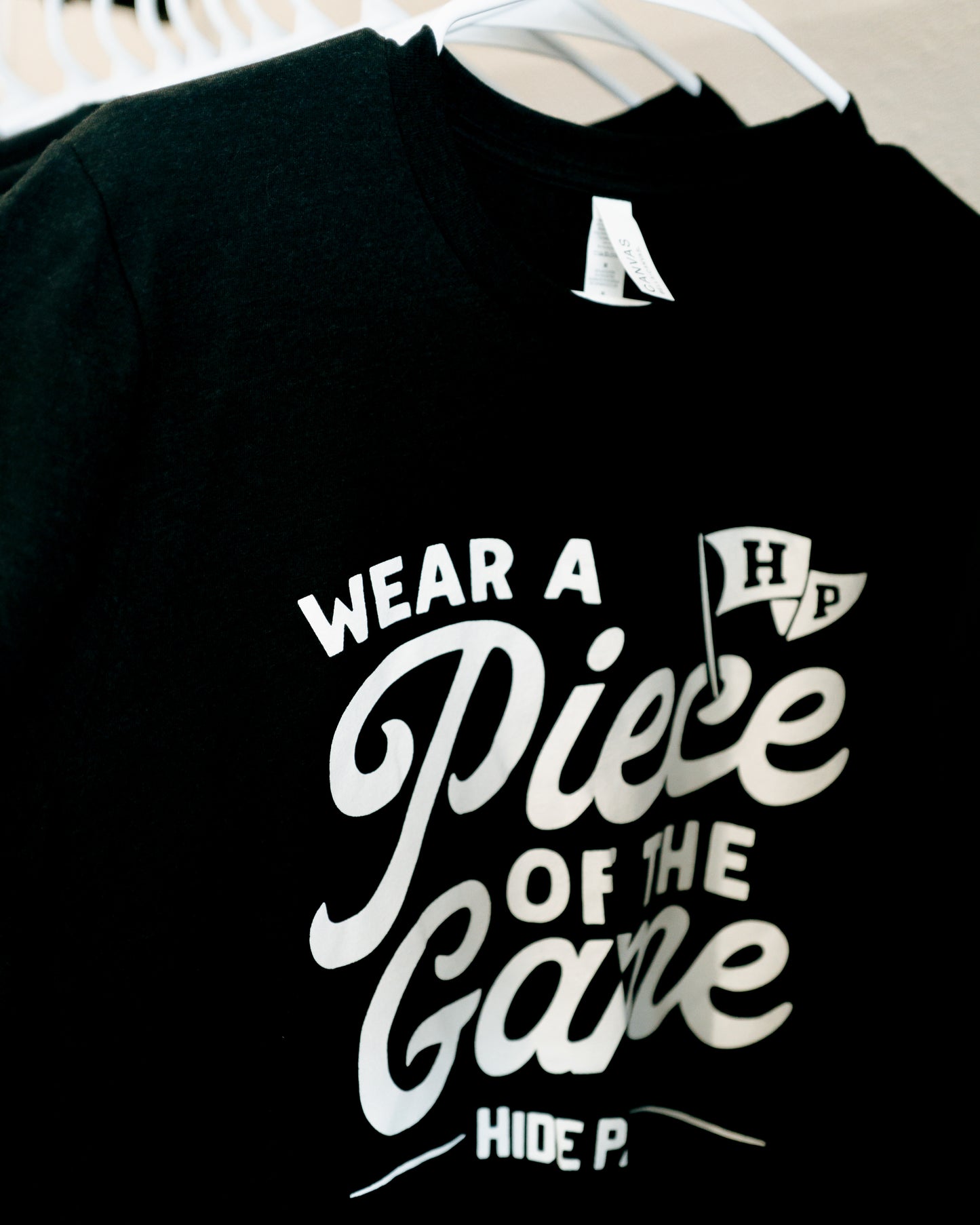 The "WEAR A PIECE OF THE GAME" Tee